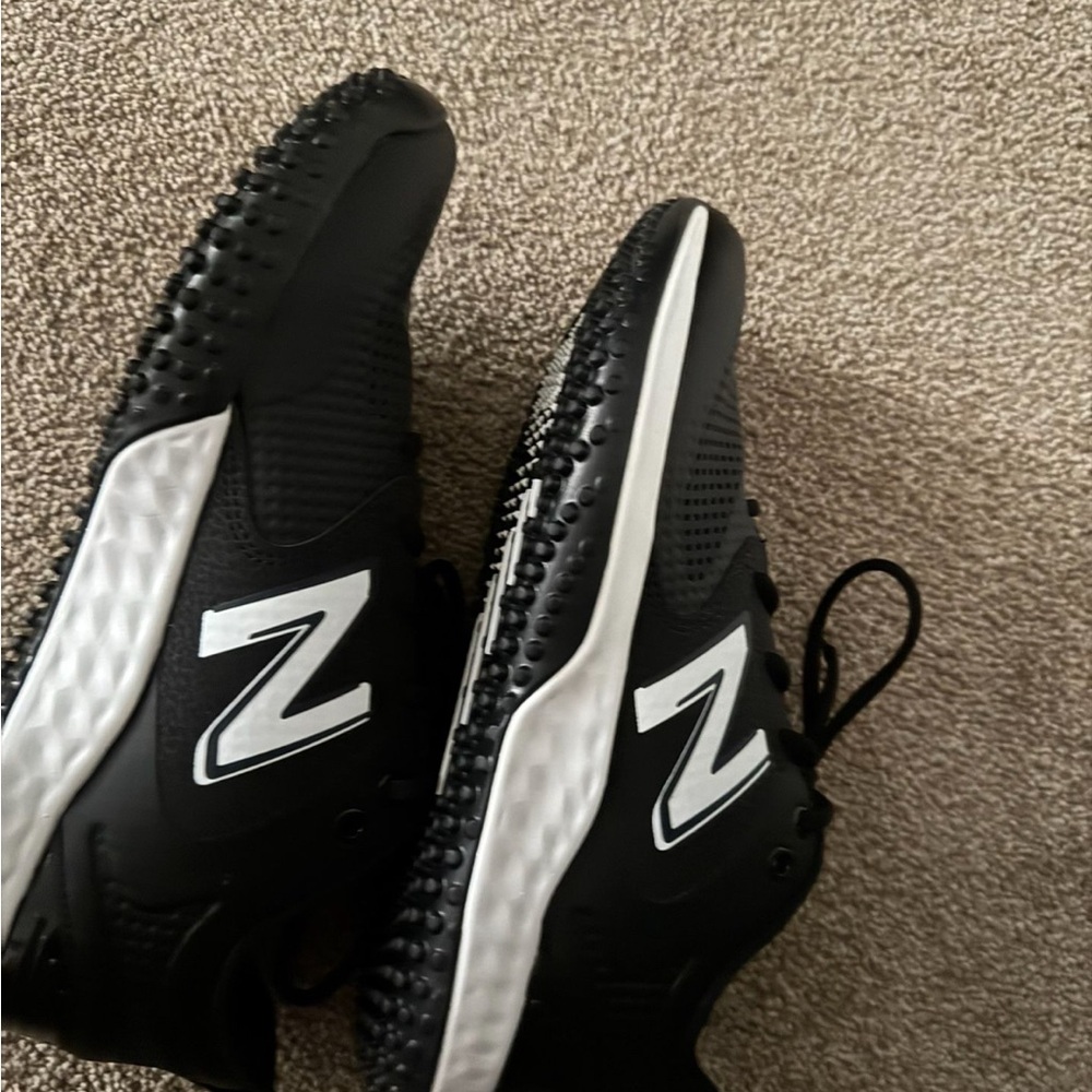 black and white new balance turf shoes size 9